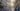 Rue commerçante animée à Paris avec des visualisations numériques illustrant la connectivité 5G+, symbolisant les usages connectés dans une ville intelligente